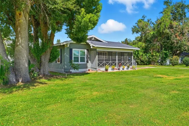 a bedroom with a bed dresser and a window