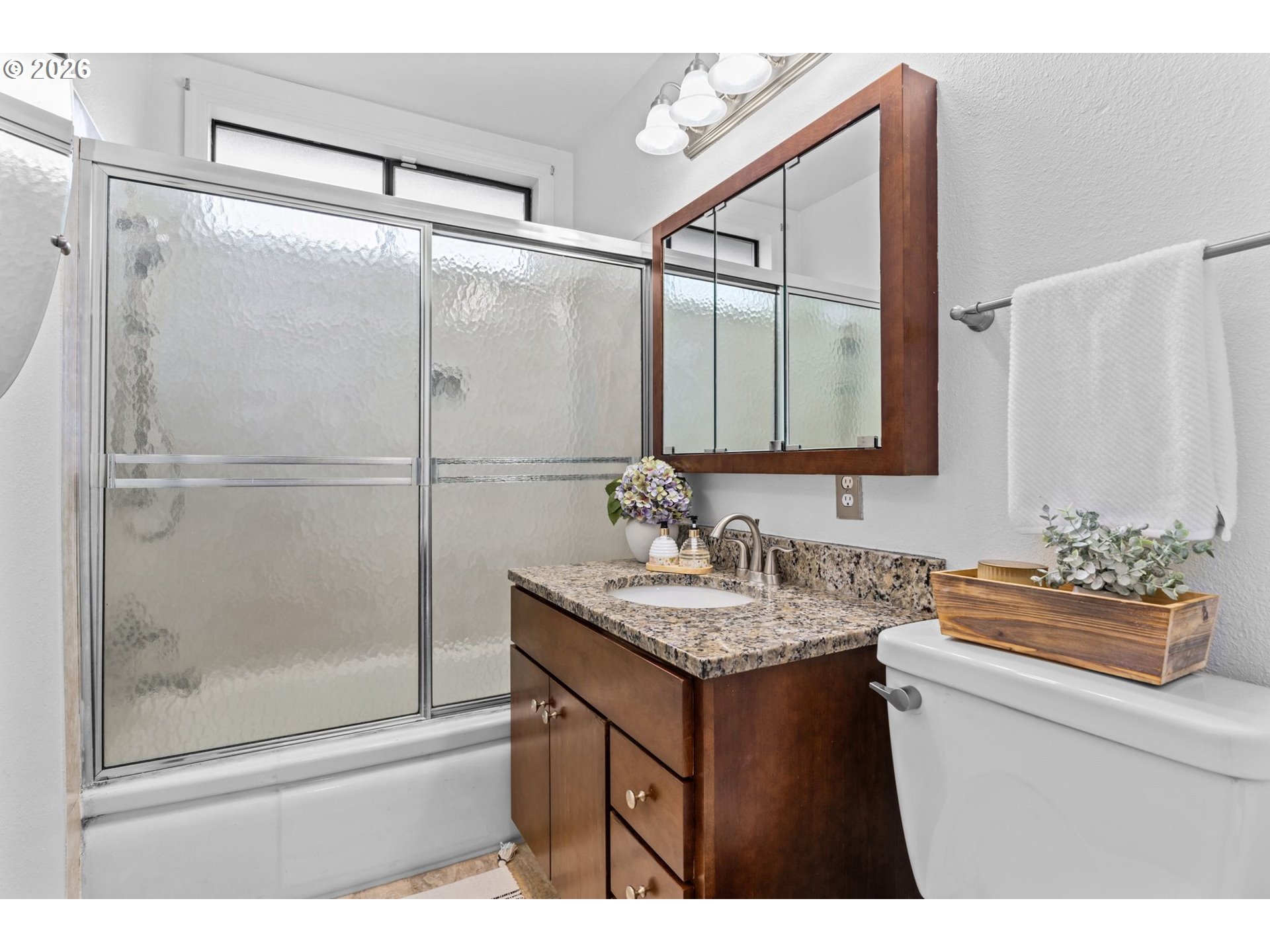 1360 Taft Street Eugene, OR 97402 - Photo 14 of 35 a bathroom with a sink and a mirror