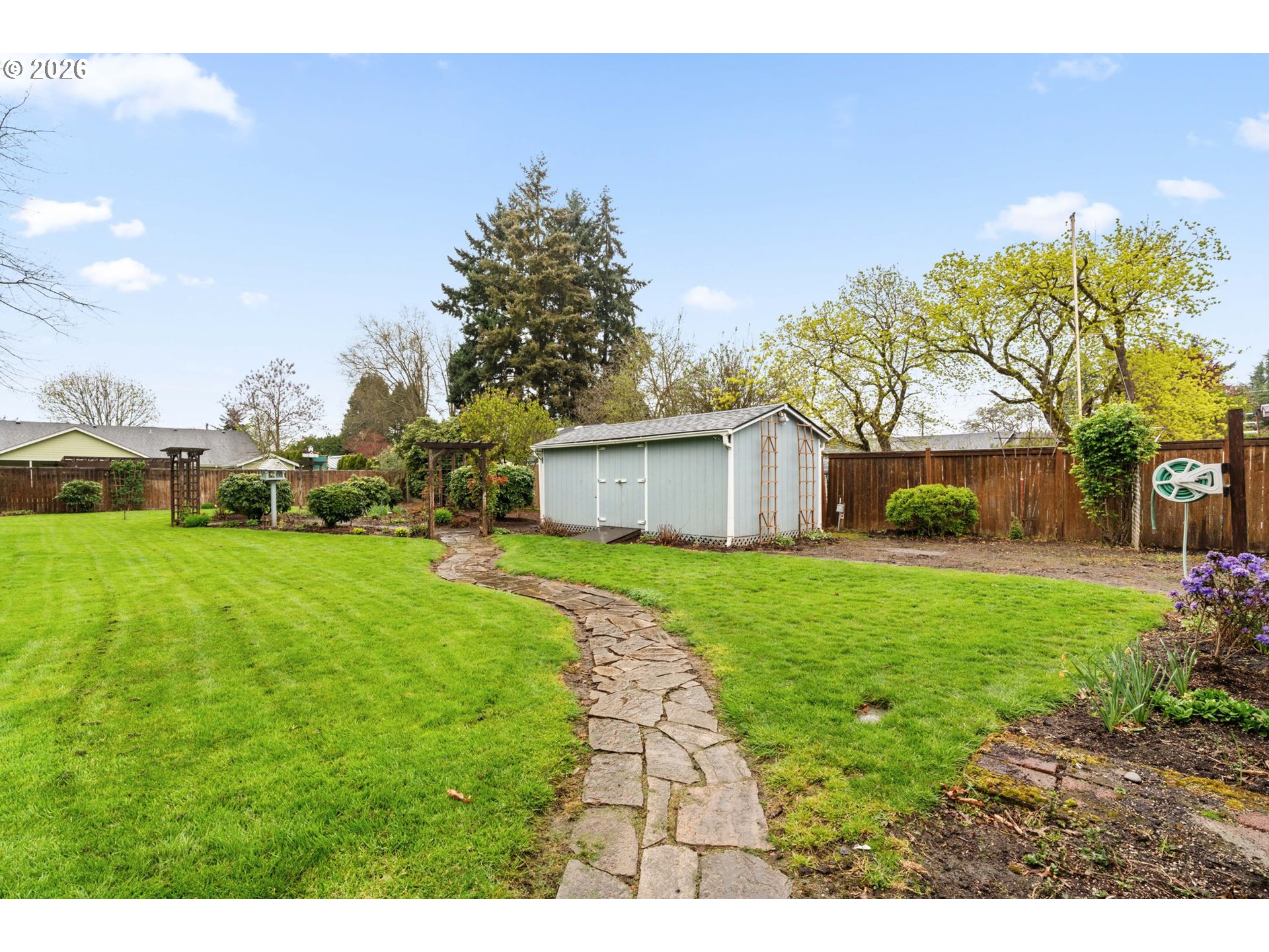 1360 Taft Street Eugene, OR 97402 - Photo 23 of 35 a front view of a house with garden
