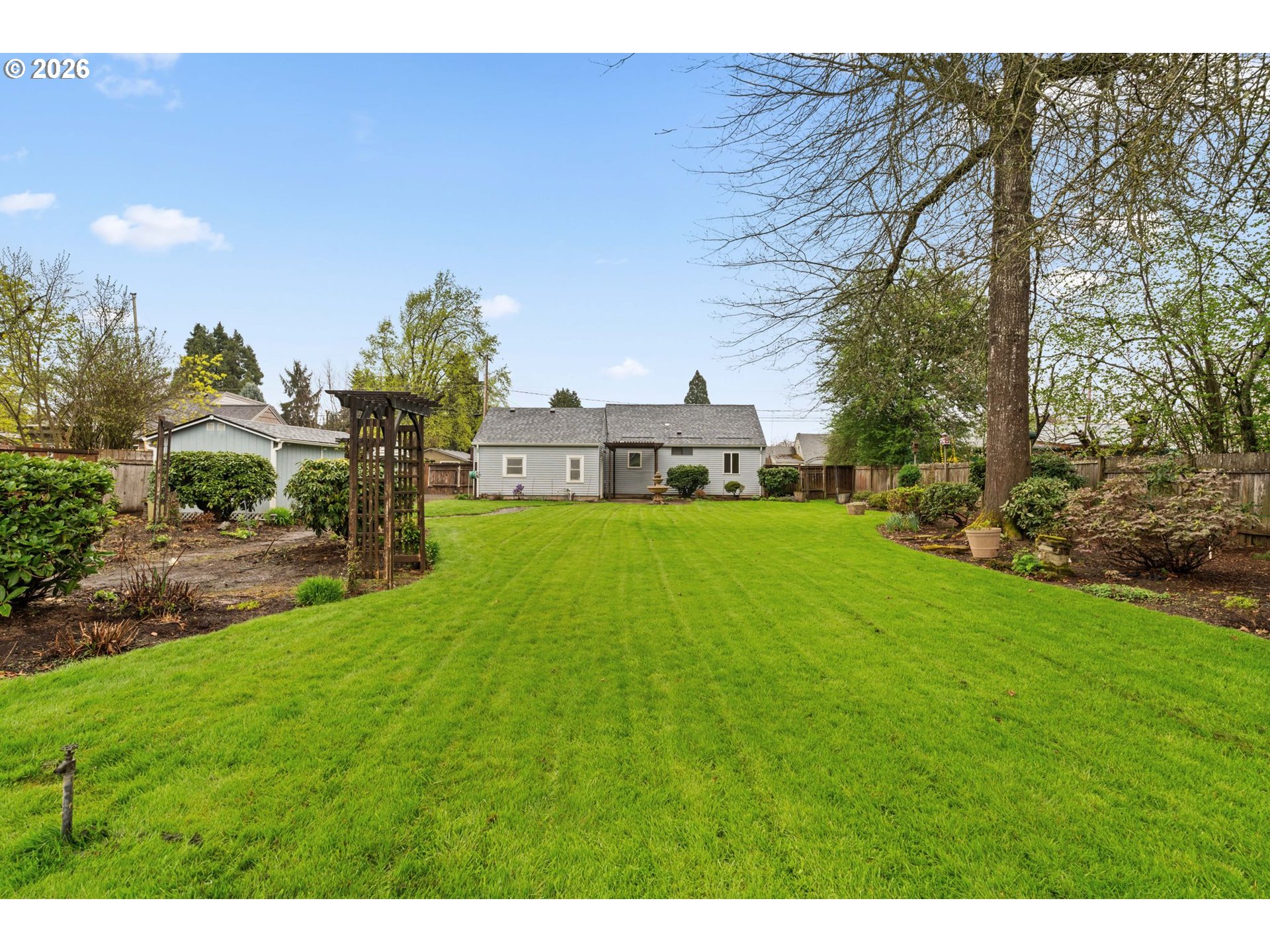 1360 Taft Street Eugene, OR 97402 - Photo 27 of 35 a view of a house with a yard