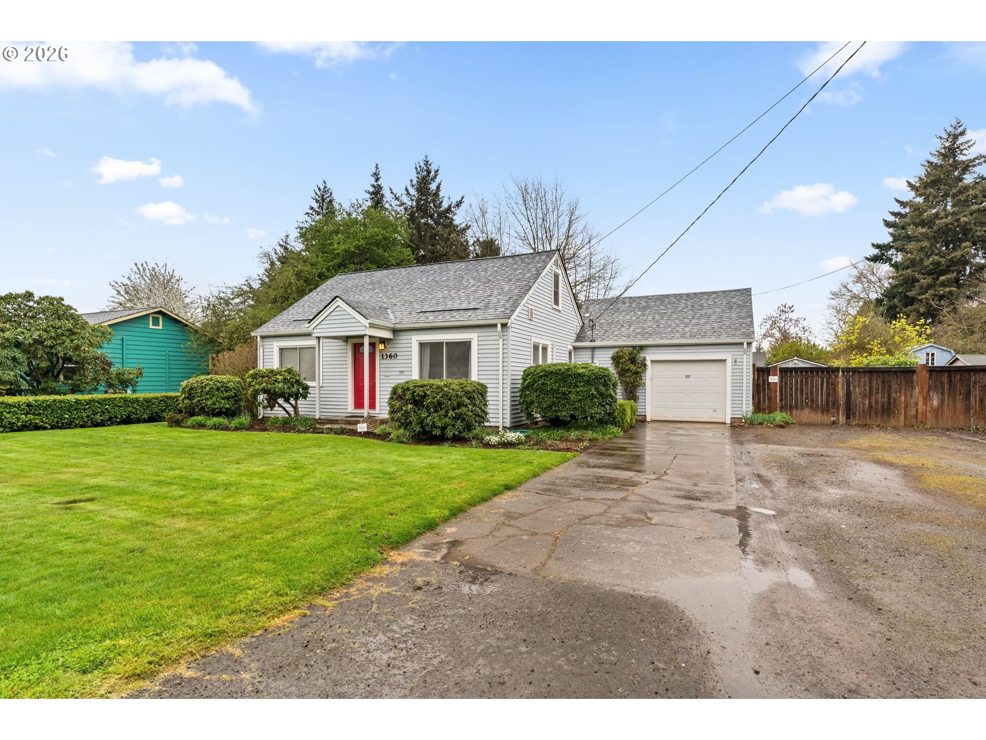 1360 Taft Street Eugene, OR 97402 - Photo 3 of 35 a front view of a house with a yard