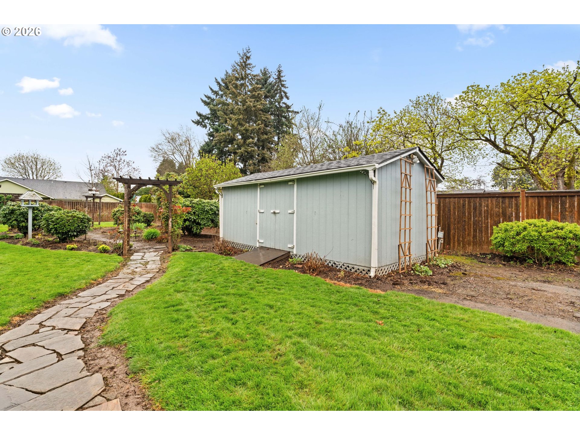 1360 Taft Street Eugene, OR 97402 - Photo 31 of 35 a view of a backyard with a garden