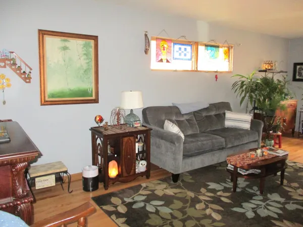 a living room with furniture and window