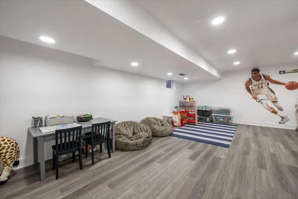 a room with furniture and wooden floor