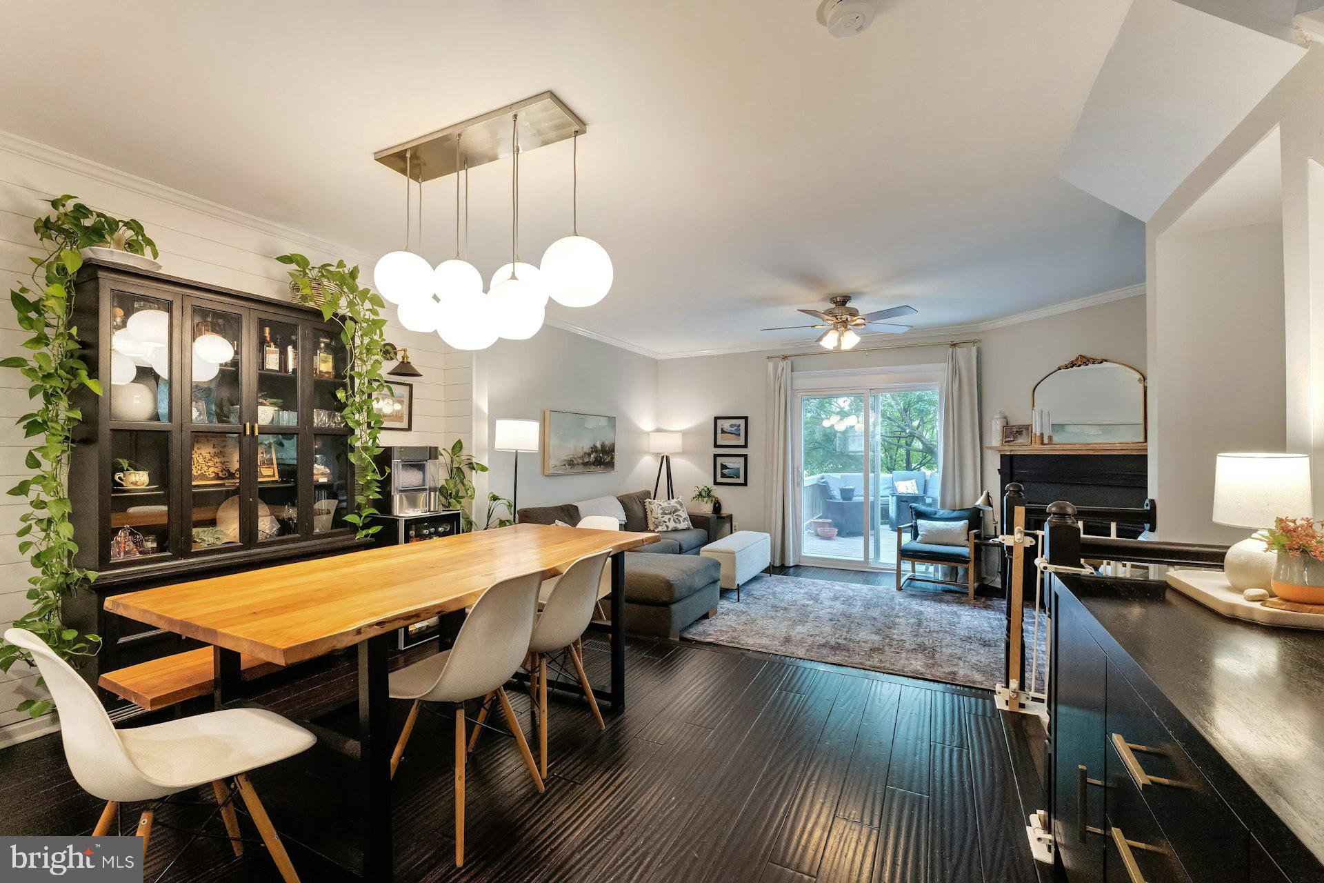 43602 Blacksmith Square Ashburn, VA 20147 - Photo 6 of 33 a view of a dining room with furniture and wooden floor