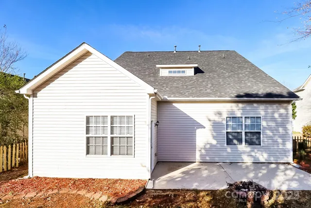 a view of a backyard of a house