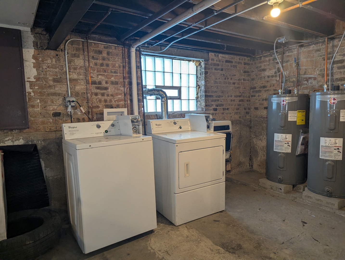 11005 South Perry Avenue, Unit 2 Chicago, IL 60628 - Photo 13 of 17 a utility room with dryer and washer