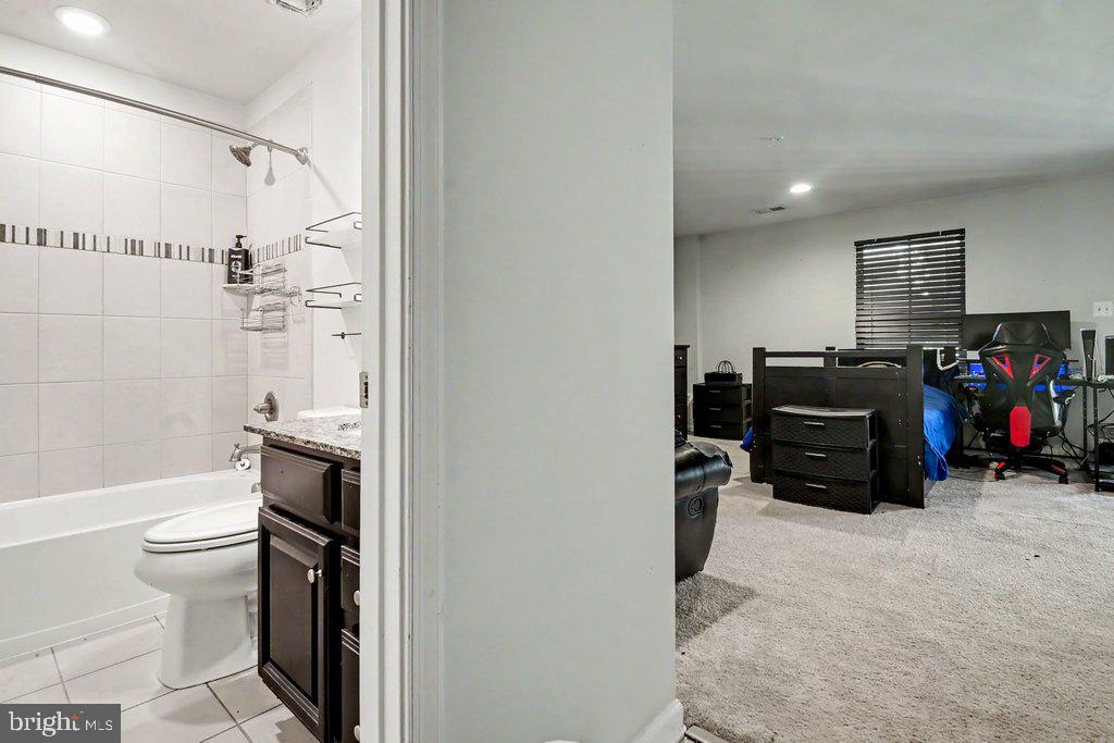 8338 Kippis Road Millersville, MD 21108 - Photo 24 of 32 LOWER LEVEL FAMILY ROOM