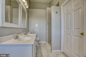 a bathroom with a sink and a bathtub