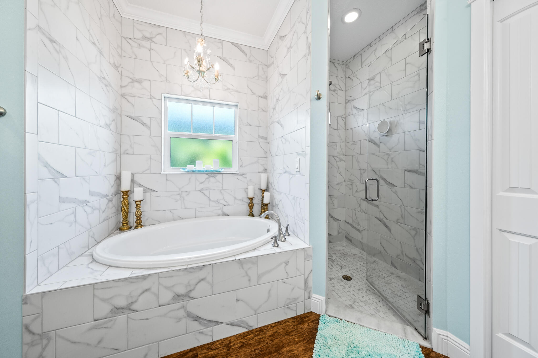 1718 Tullagee Avenue Melbourne, FL 32940 - Photo 15 of 35 a bathroom with a bathtub and a shower