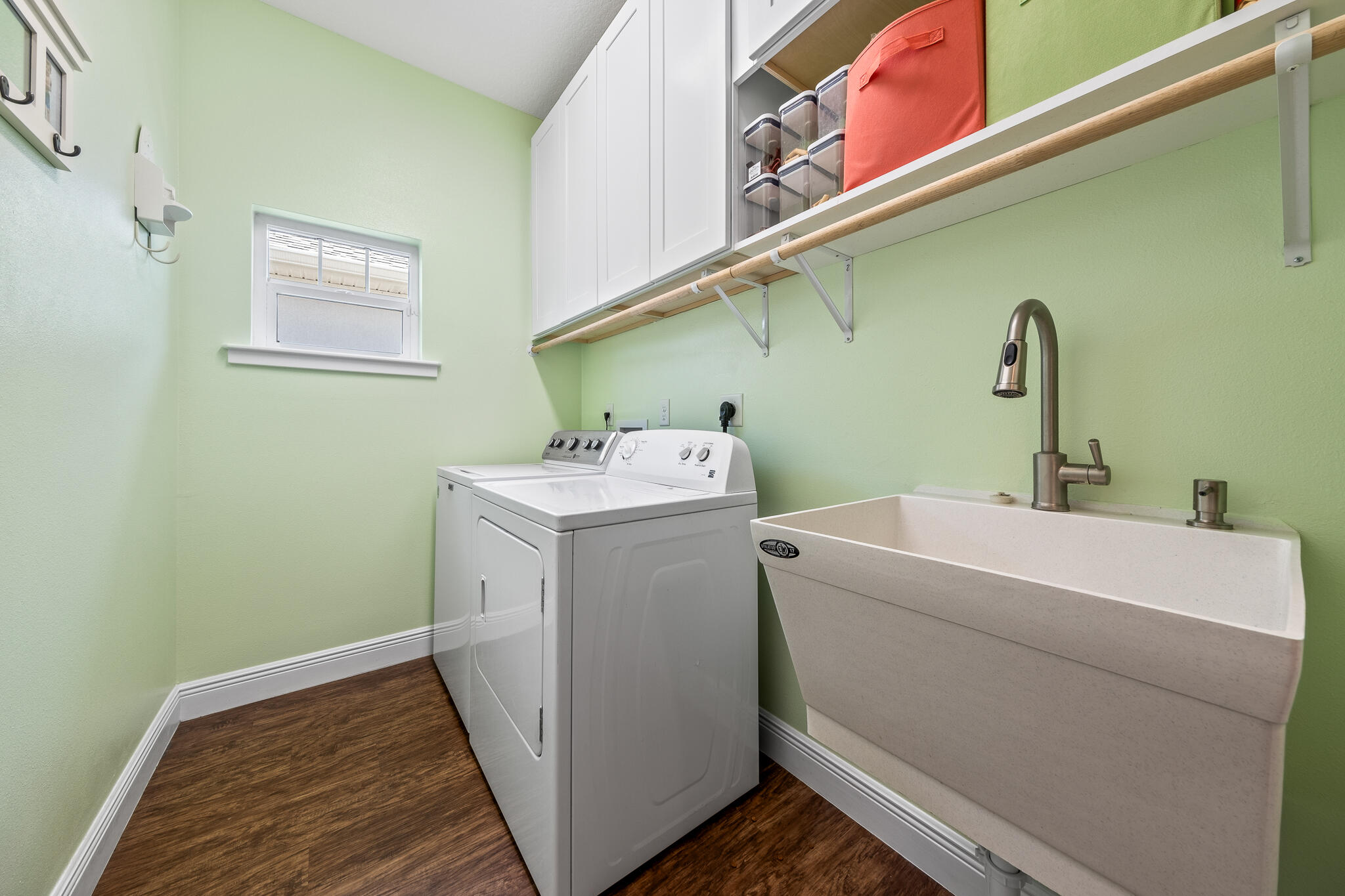 1718 Tullagee Avenue Melbourne, FL 32940 - Photo 17 of 35 a utility room with dryer and washer