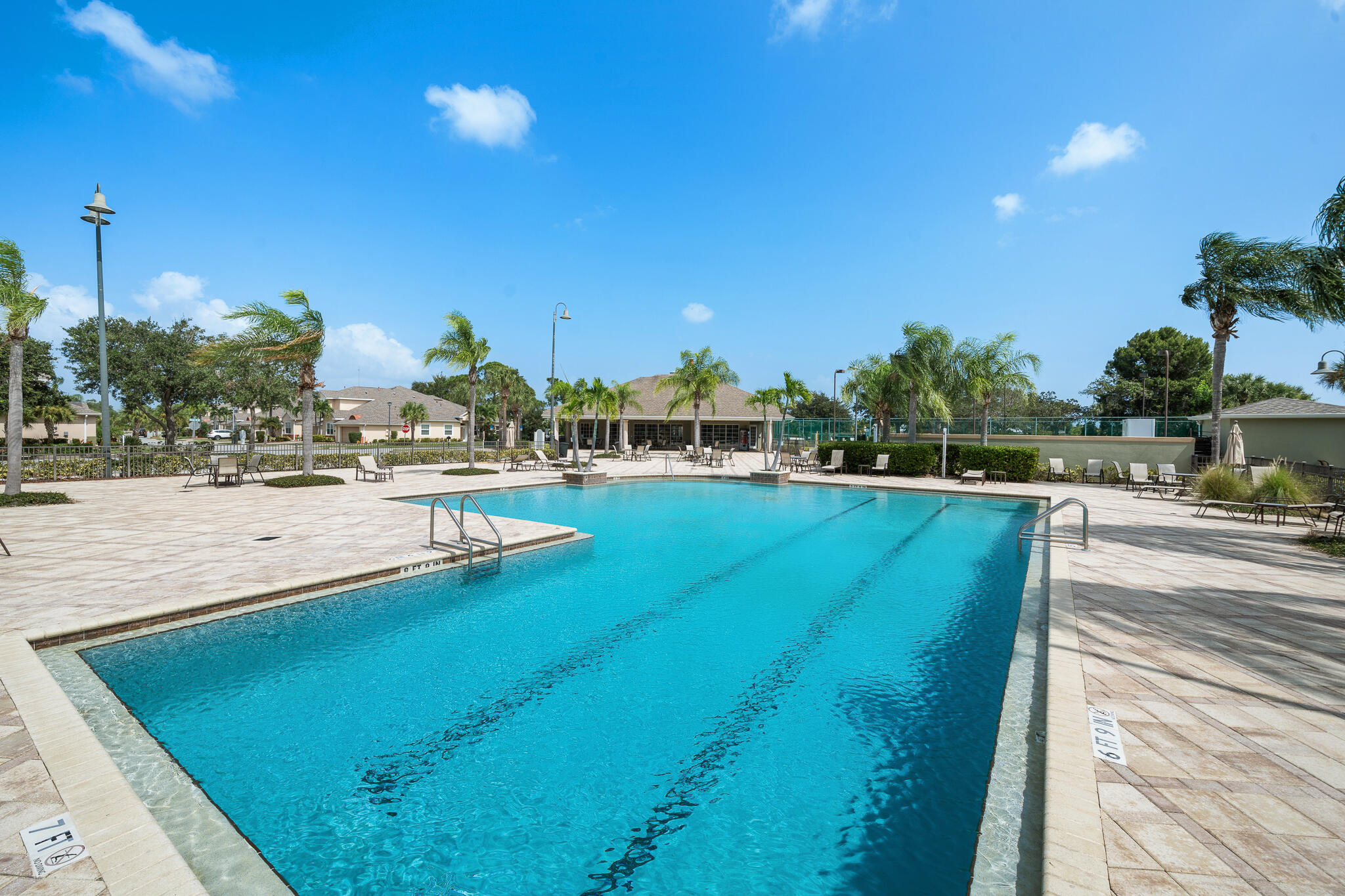 1718 Tullagee Avenue Melbourne, FL 32940 - Photo 2 of 35 a view of a swimming pool with an outdoor space and seating area