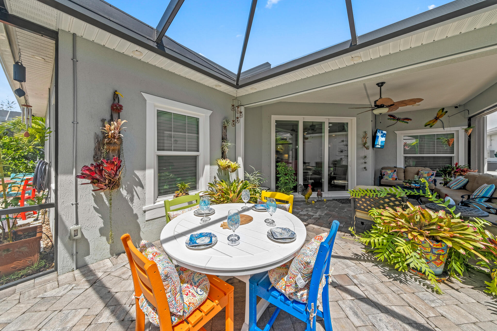 1718 Tullagee Avenue Melbourne, FL 32940 - Photo 26 of 35 a view of a dining table and chairs in patio