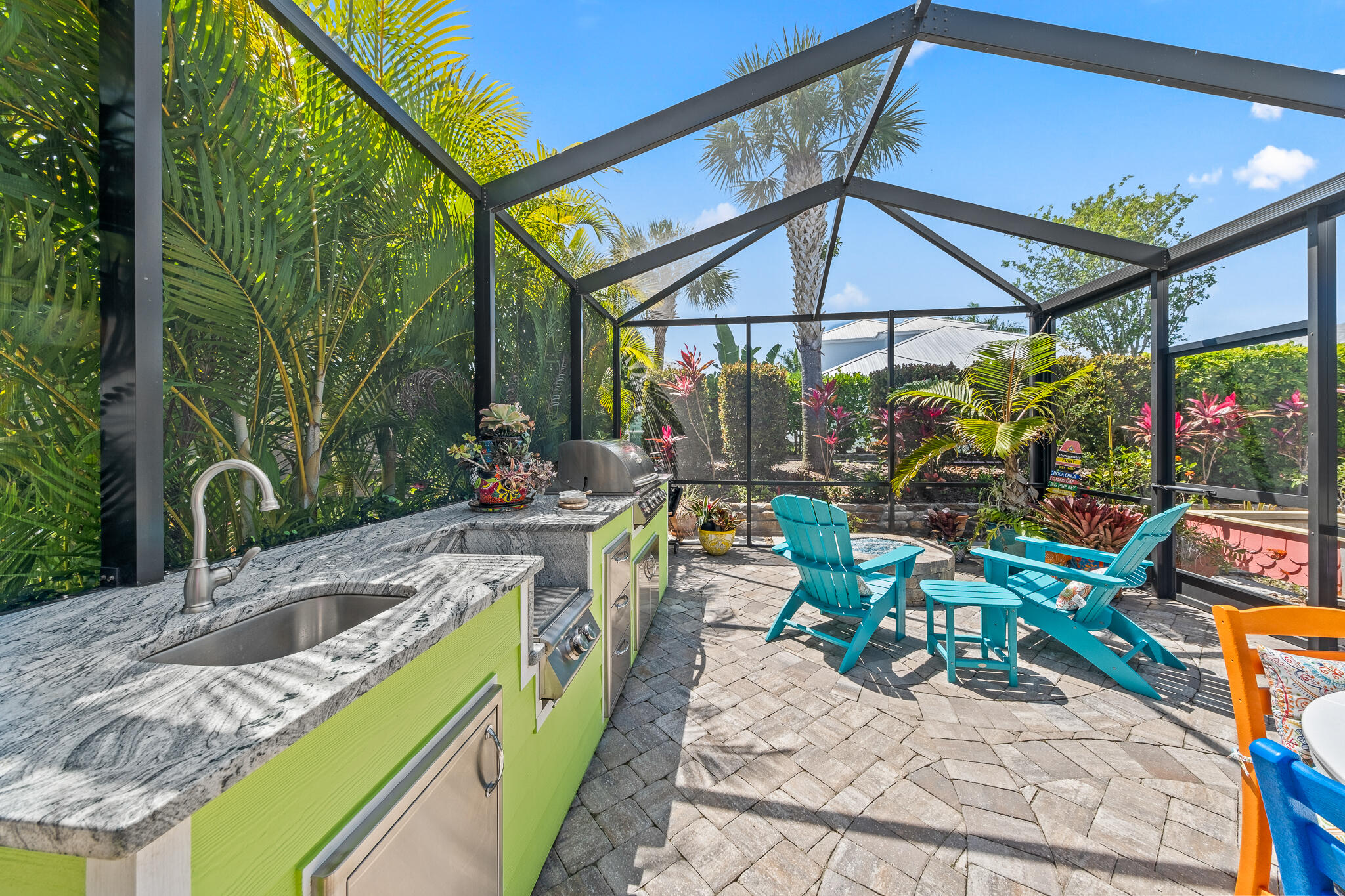 1718 Tullagee Avenue Melbourne, FL 32940 - Photo 27 of 35 a view of a chairs and table in the patio