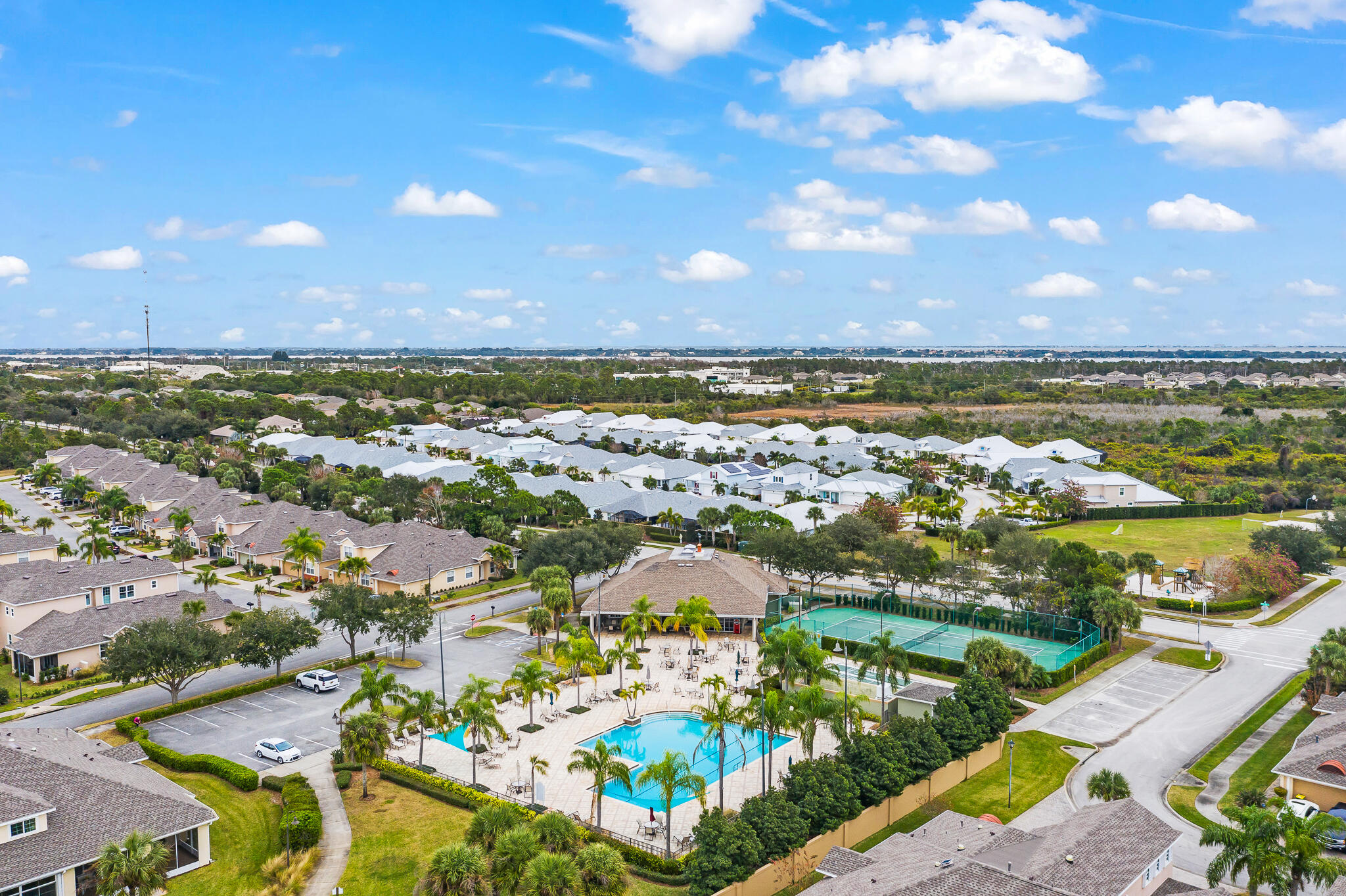 1718 Tullagee Avenue Melbourne, FL 32940 - Photo 34 of 35 an aerial view of residential building and lake