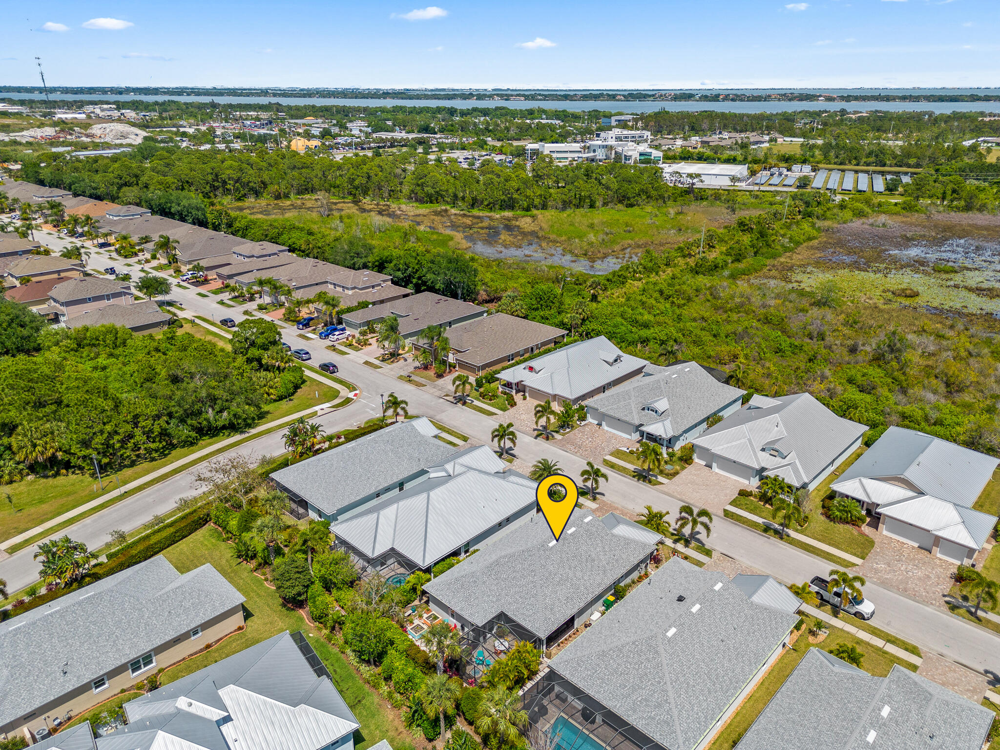 1718 Tullagee Avenue Melbourne, FL 32940 - Photo 35 of 35 an aerial view of residential houses with outdoor space