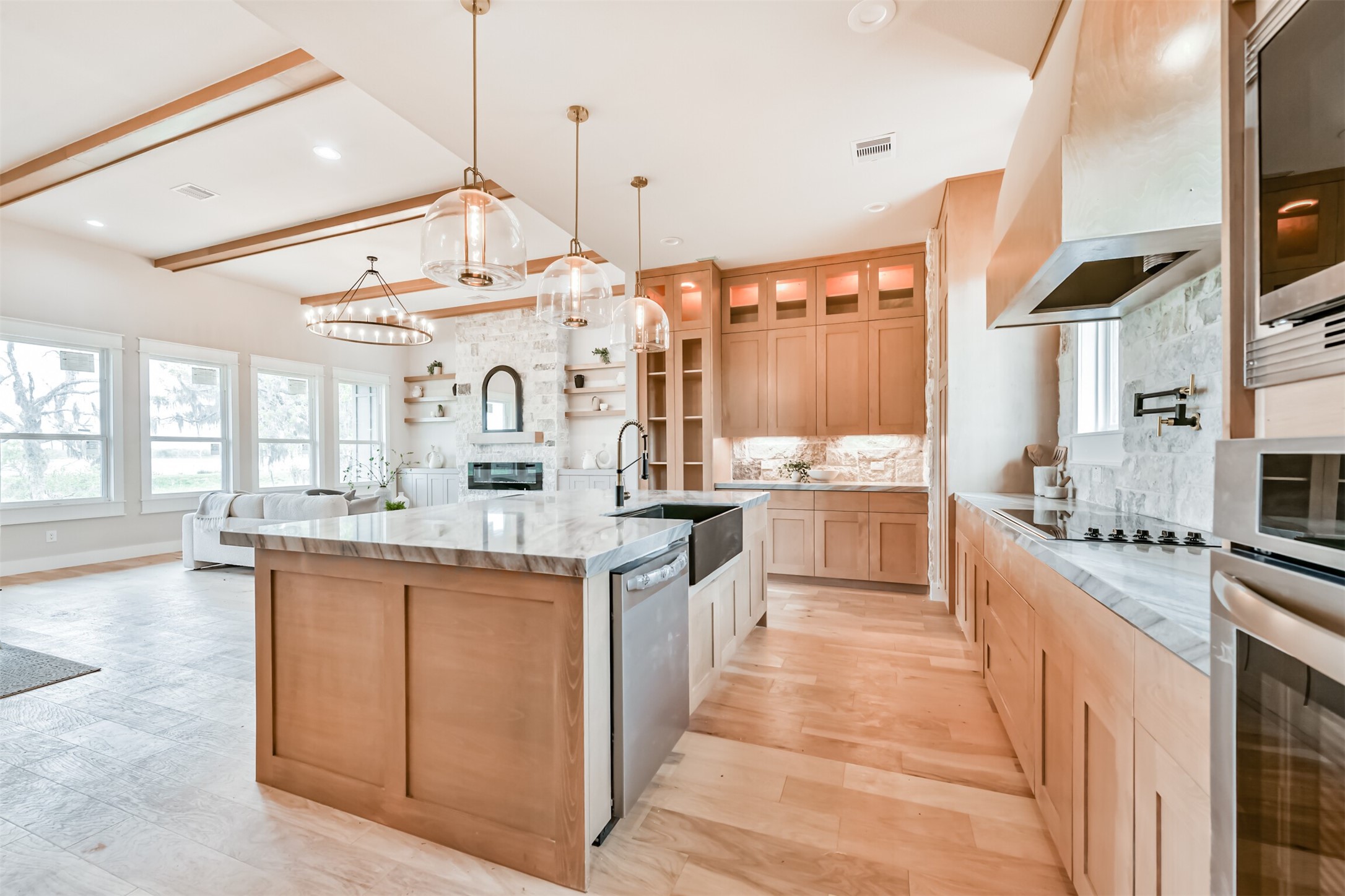 250 Pony Trail Angleton, TX 77515 - Photo 25 of 32 Spacious kitchen seamlessly flows into the inviting living room.