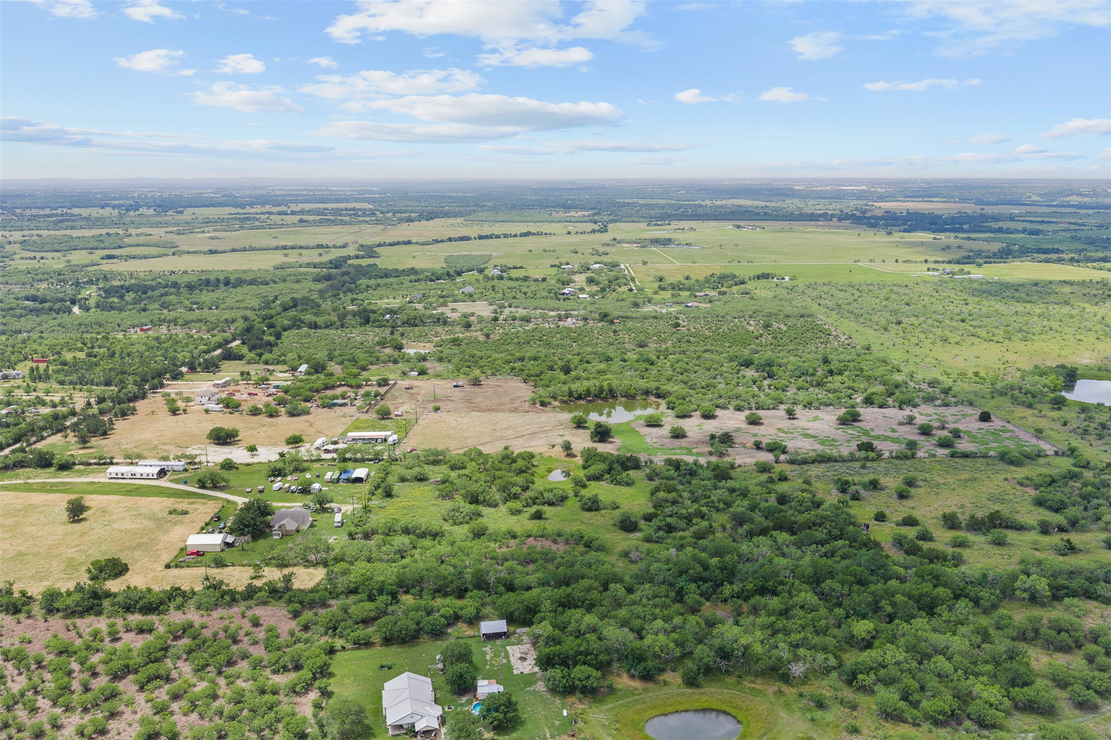 3315 Dry Creek Road Lockhart, TX 78644 - Photo 22 of 26 Vast, verdant landscape offering abundant natural beauty and tranquil, secluded living.