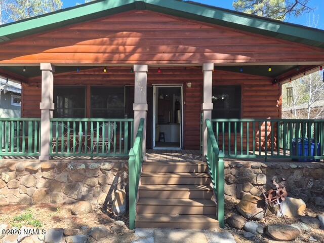 a view of a house with a porch