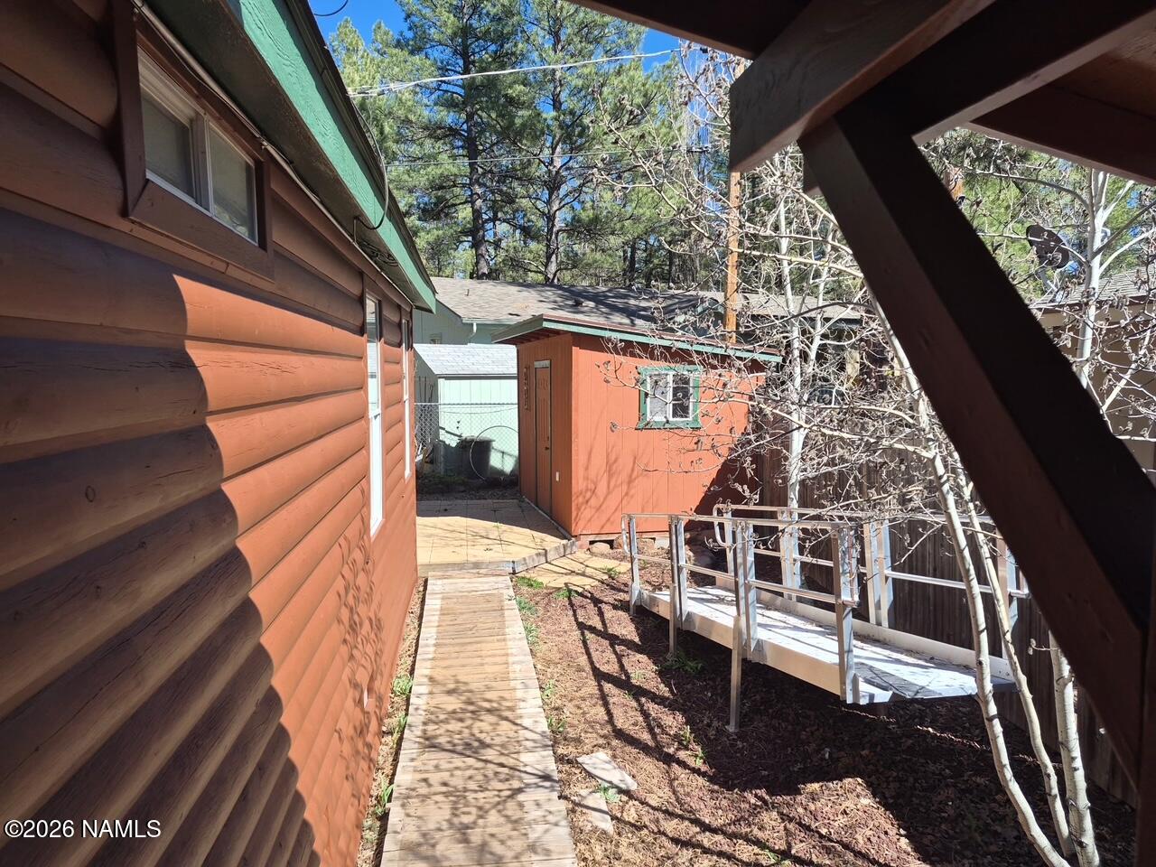 17075 Grizzly Ridge Munds Park, AZ 86017 - Photo 30 of 31 a balcony with view of car parked