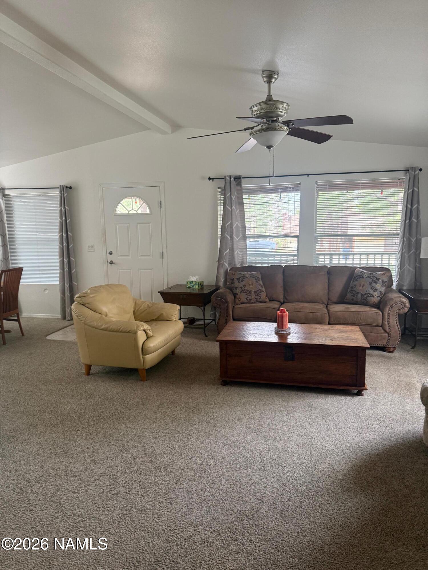 17075 Grizzly Ridge Munds Park, AZ 86017 - Photo 7 of 31 a spacious bedroom with a bed and window