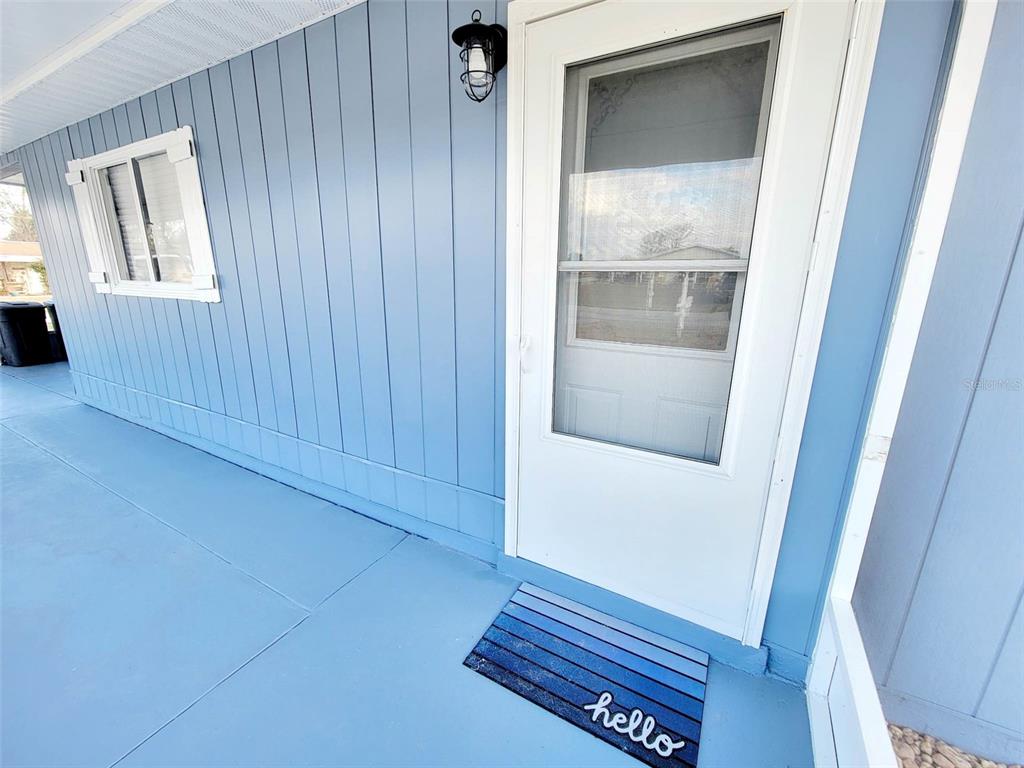9760 Southwest 101st Lane Ocala, FL 34481 - Photo 17 of 17 a view of an empty room and wooden floor