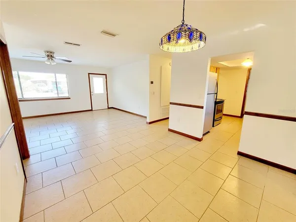 a view of a storage & utility room with window
