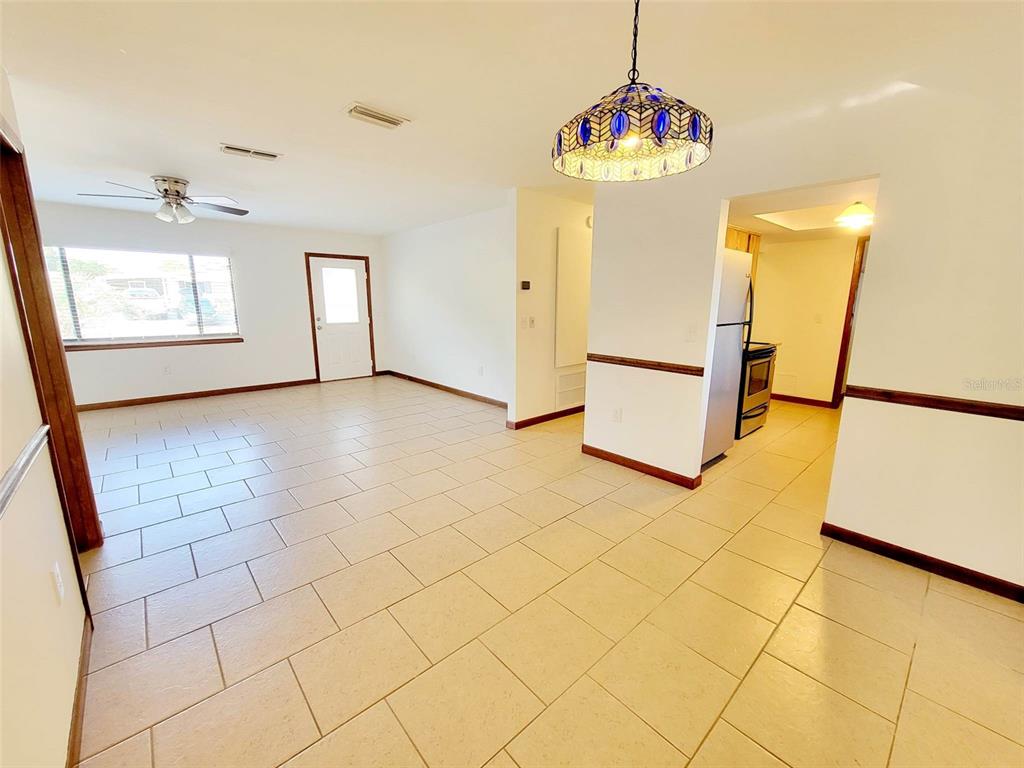 9760 Southwest 101st Lane Ocala, FL 34481 - Photo 7 of 17 a view of a storage & utility room with window