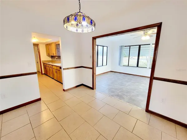 a view of a hallway with windows