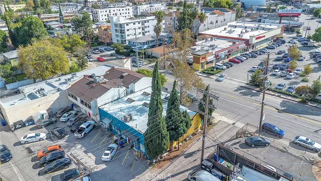 an aerial view of a city with lots of residential buildings