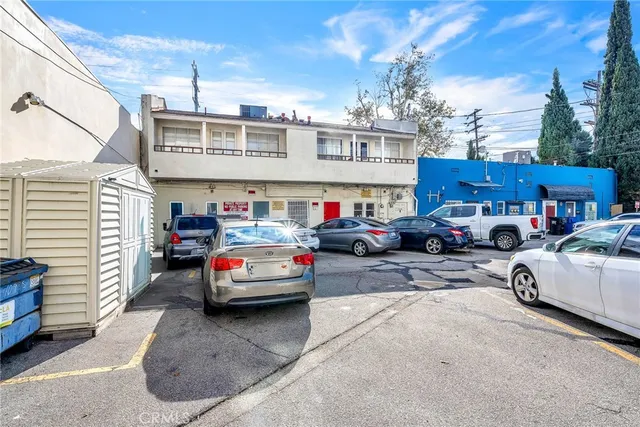 a cars parked in front of a building