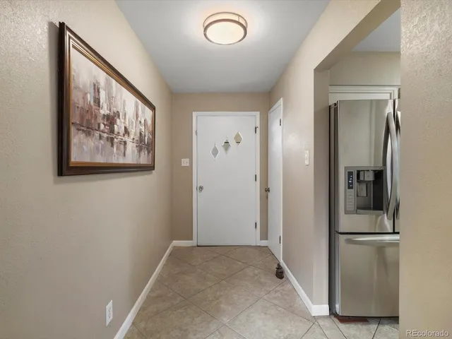 a bedroom with a bed and a closet