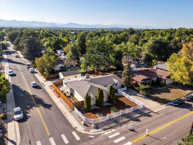 an aerial view of houses with outdoor space