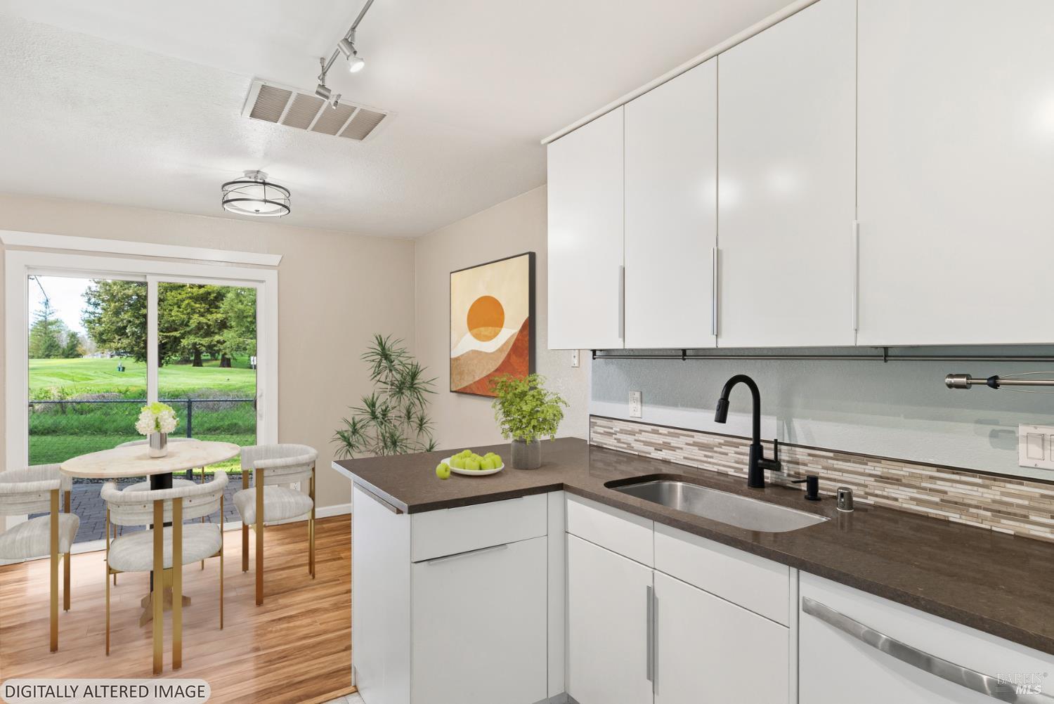790 Hudis Street Rohnert Park, CA 94928 - Photo 13 of 41 a kitchen with a sink cabinets and window