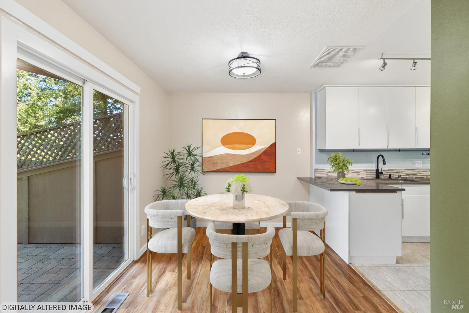 790 Hudis Street Rohnert Park, CA 94928 - Photo 15 of 41 a view of a dining room with furniture and wooden floor