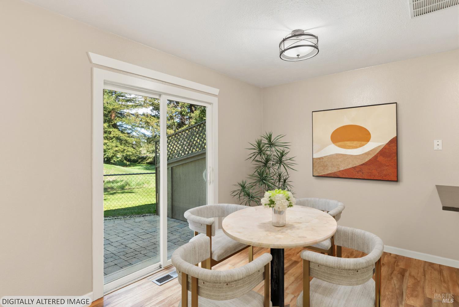 790 Hudis Street Rohnert Park, CA 94928 - Photo 17 of 41 a dining room with a table and chairs