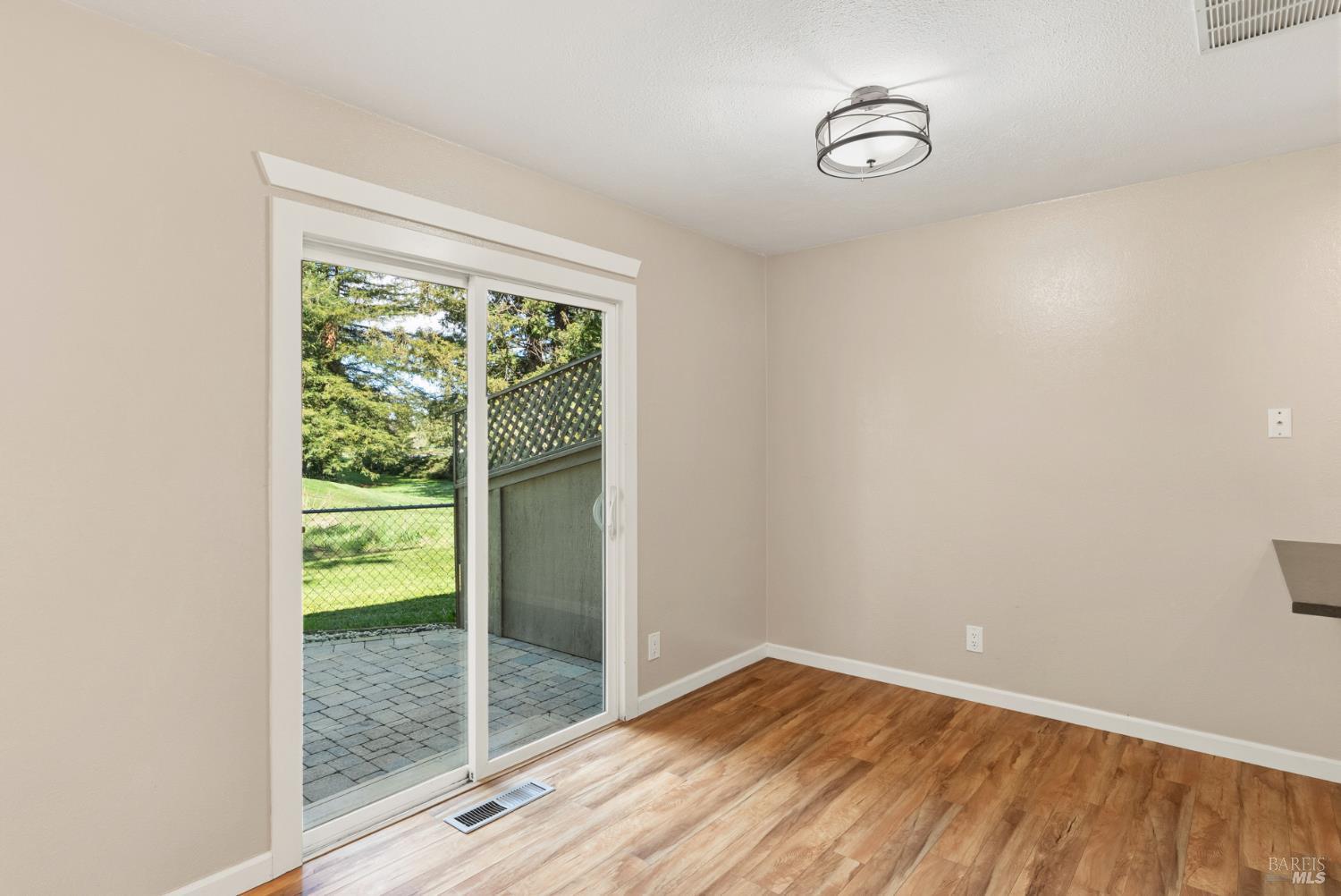 790 Hudis Street Rohnert Park, CA 94928 - Photo 25 of 41 a view of an empty room with glass door