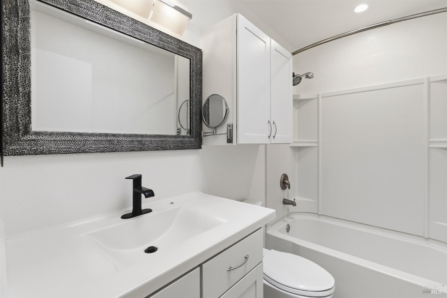 790 Hudis Street Rohnert Park, CA 94928 - Photo 26 of 41 a bathroom with a sink a toilet and a bathtub