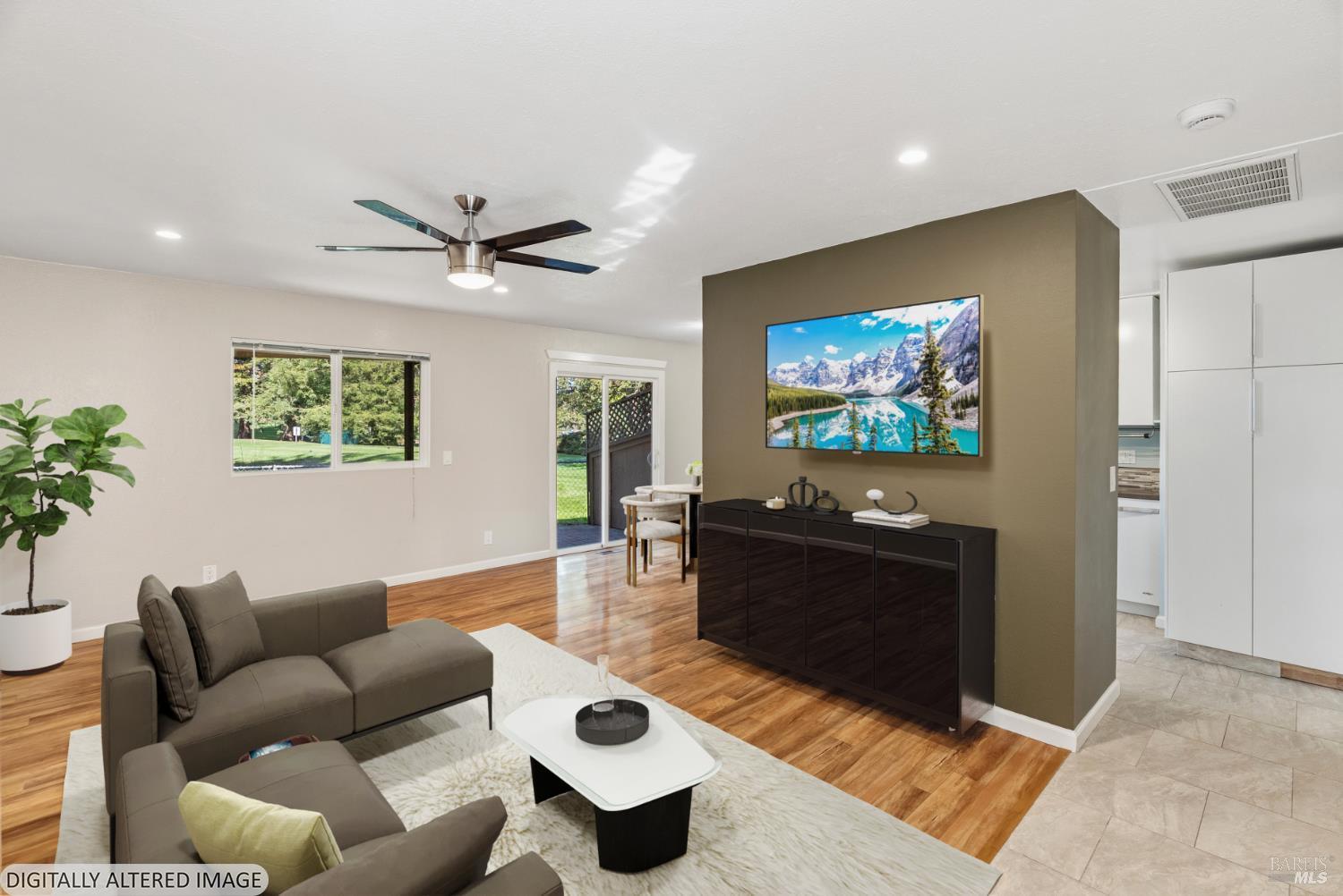 790 Hudis Street Rohnert Park, CA 94928 - Photo 5 of 41 a living room with furniture and a flat screen tv
