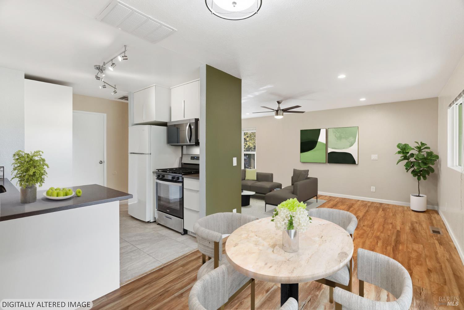 790 Hudis Street Rohnert Park, CA 94928 - Photo 10 of 41 a kitchen with a table and chairs in it