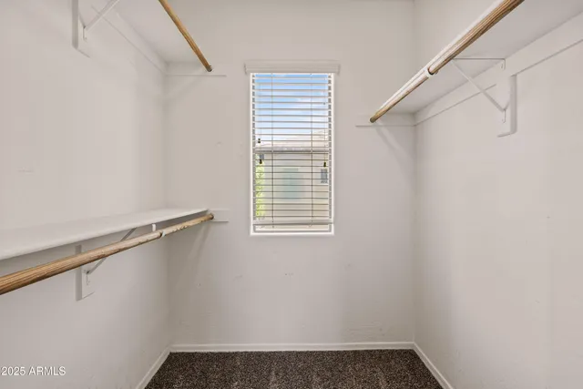 a view of a room with racks on the wall