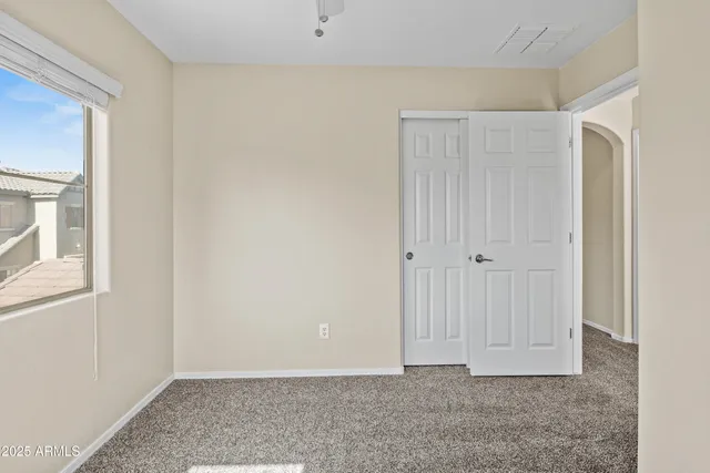 an empty room with windows