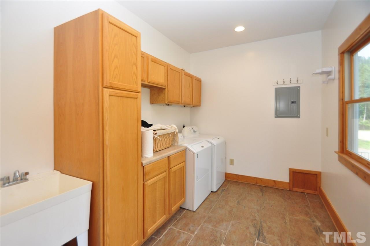 738 Castle Rock Farm Road Pittsboro, NC 27312 - Photo 13 of 25 a view of a storage & utility room with a sink