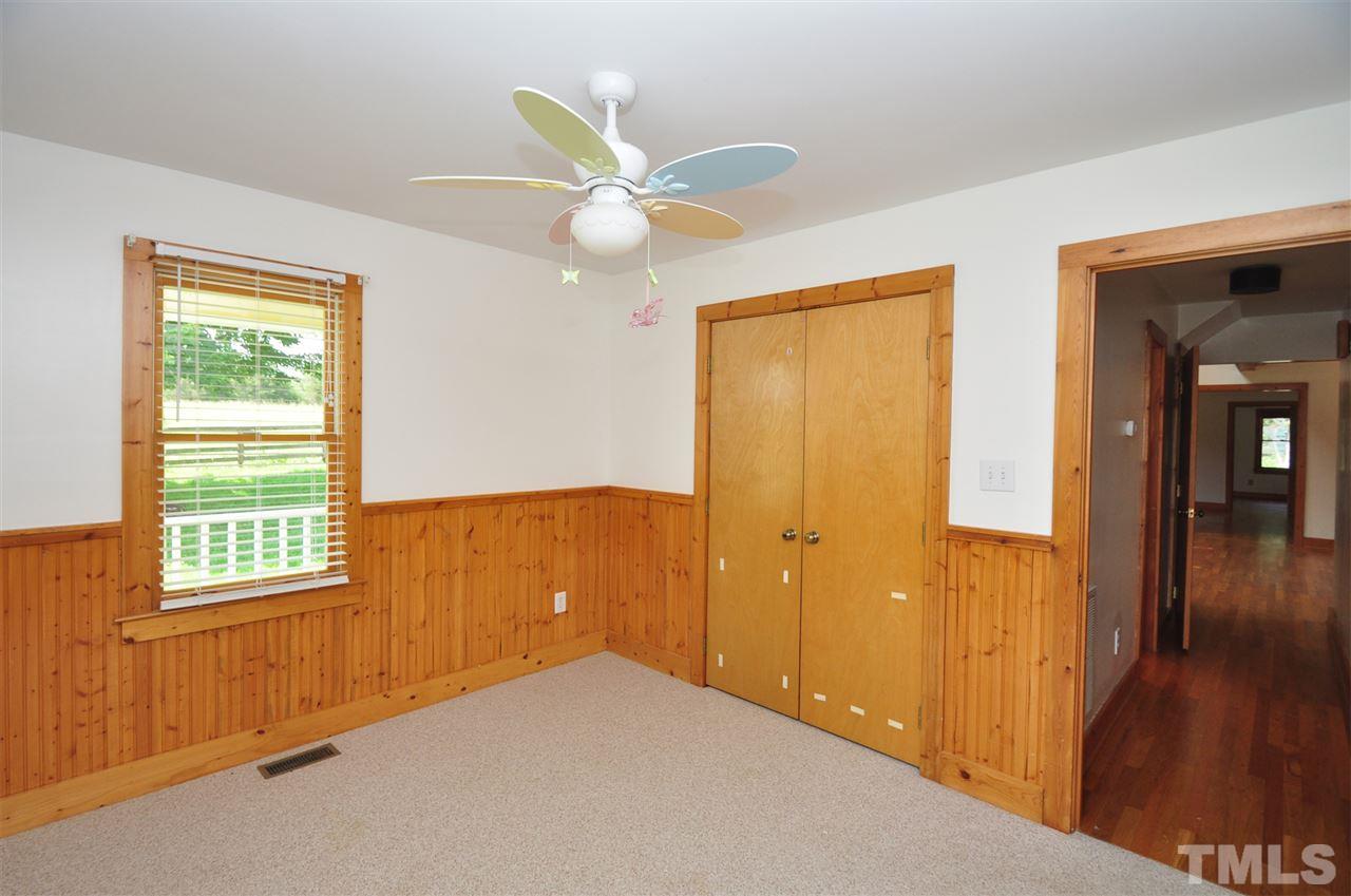 738 Castle Rock Farm Road Pittsboro, NC 27312 - Photo 16 of 25 a view of an empty room and window