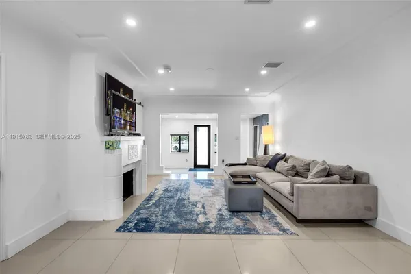 a living room with furniture and a couch