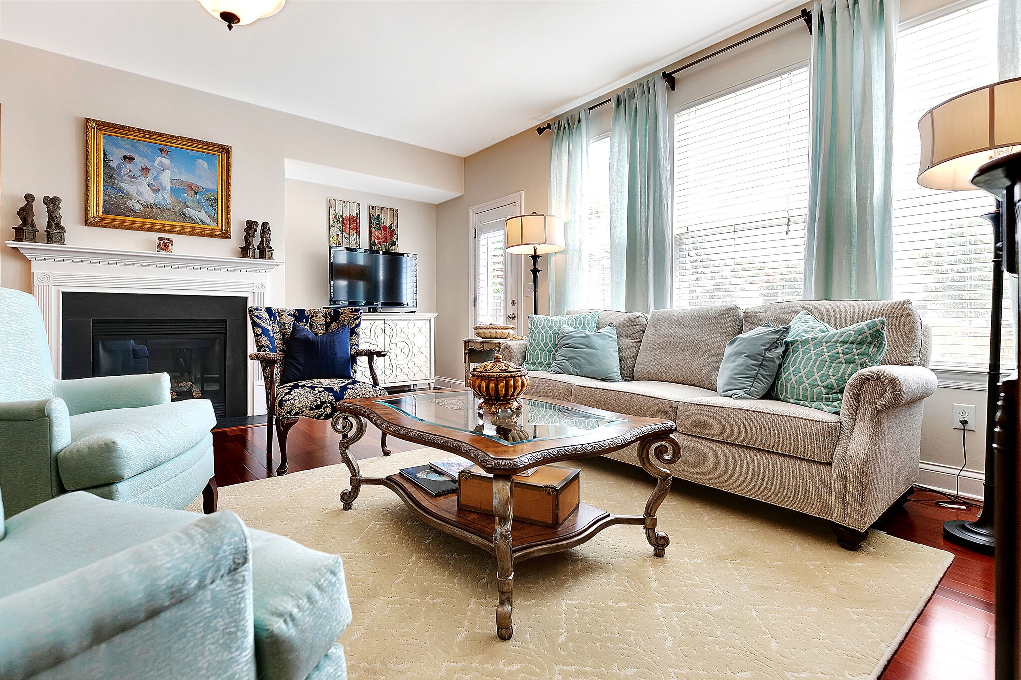 201 Verde Meadow Drive Franklin, TN 37067 - Photo 11 of 40 a living room with furniture and a fireplace