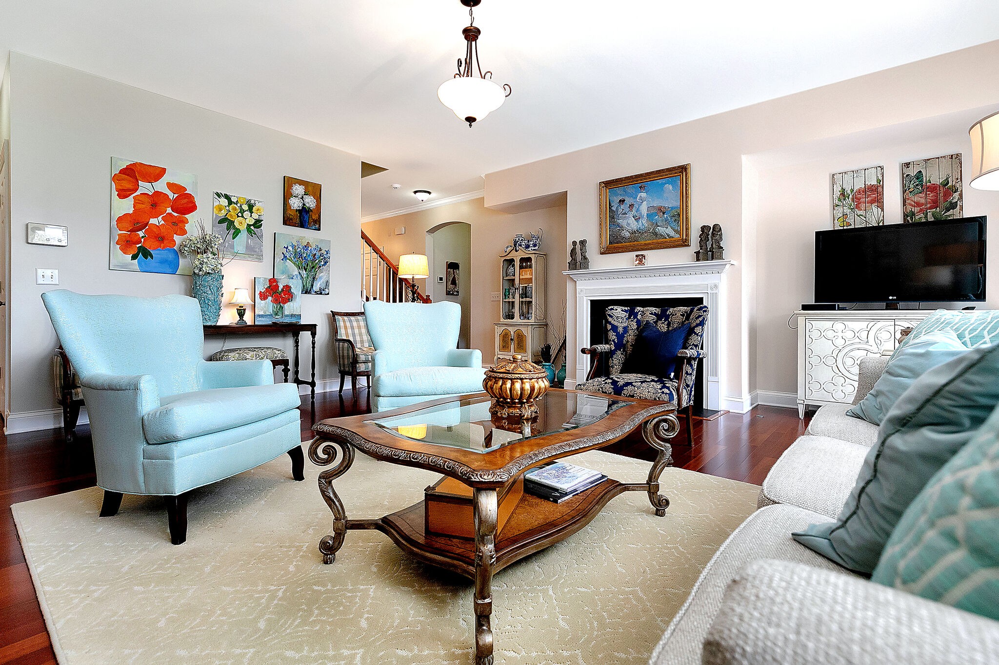 201 Verde Meadow Drive Franklin, TN 37067 - Photo 12 of 40 a living room with furniture and a flat screen tv