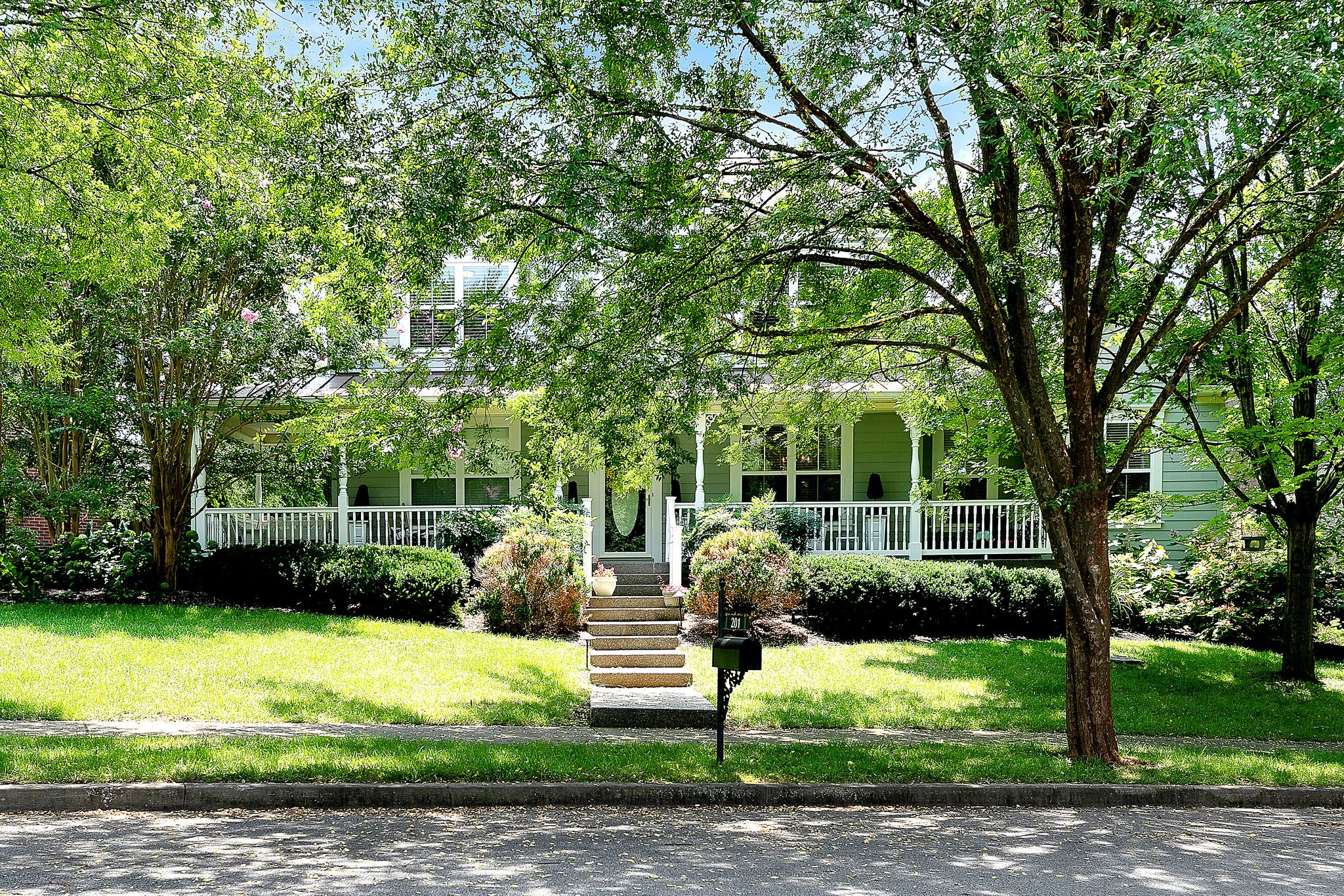 201 Verde Meadow Drive Franklin, TN 37067 - Photo 2 of 40 a view of a garden with a tree