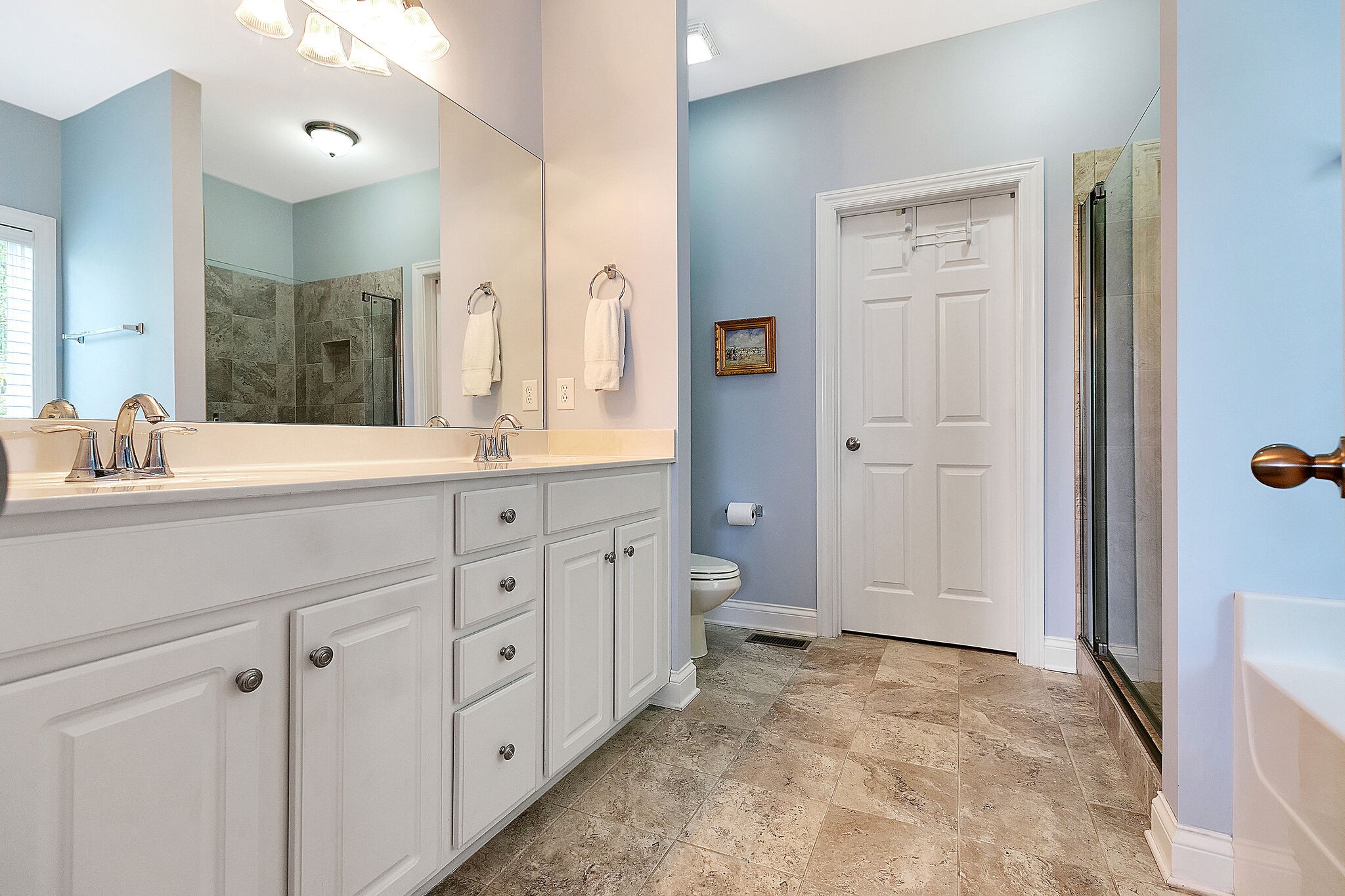 201 Verde Meadow Drive Franklin, TN 37067 - Photo 25 of 40 a spacious bathroom with a granite countertop sink mirror and a