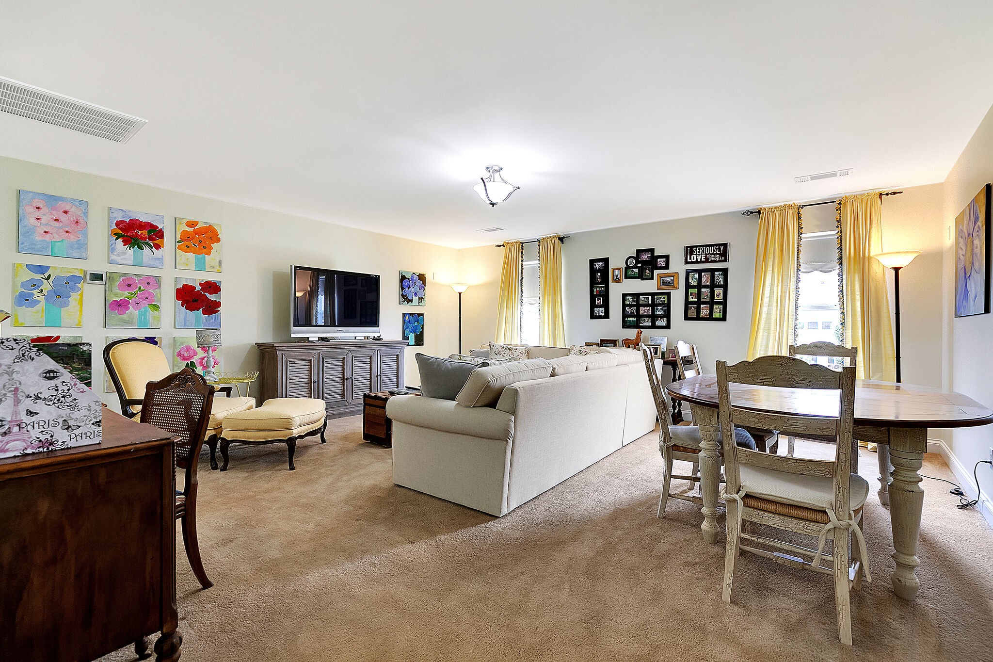 201 Verde Meadow Drive Franklin, TN 37067 - Photo 28 of 40 a living room with furniture and a flat screen tv